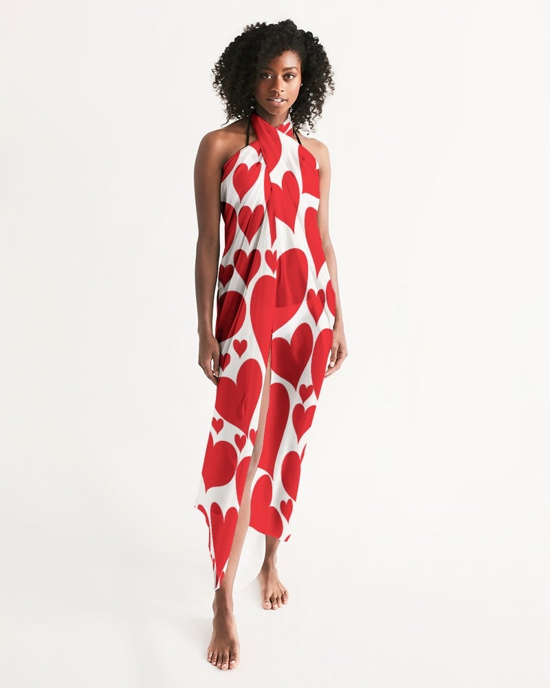 A vibrant Women's Wrap Sarong featuring a Love Red Hearts design, perfect for beach and poolside wear, showcasing its lightweight and flowy fabric.