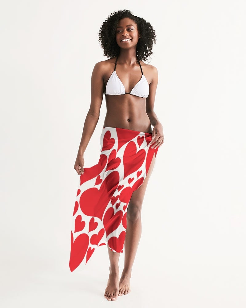 A vibrant Women's Wrap Sarong featuring a Love Red Hearts design, perfect for beach and poolside wear, showcasing its lightweight and flowy fabric.