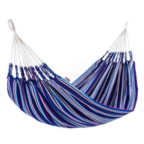 A vibrant Woven Double Hammock in green, blue, and pink tones, perfect for outdoor relaxation.