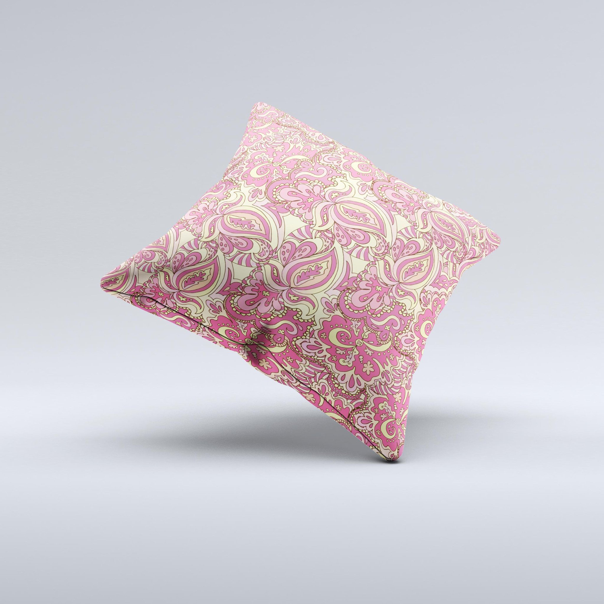 Yellow and pink paisley floral decorative throw pillow, handcrafted with high thread count fabric and polyester filling, showcasing unique design.