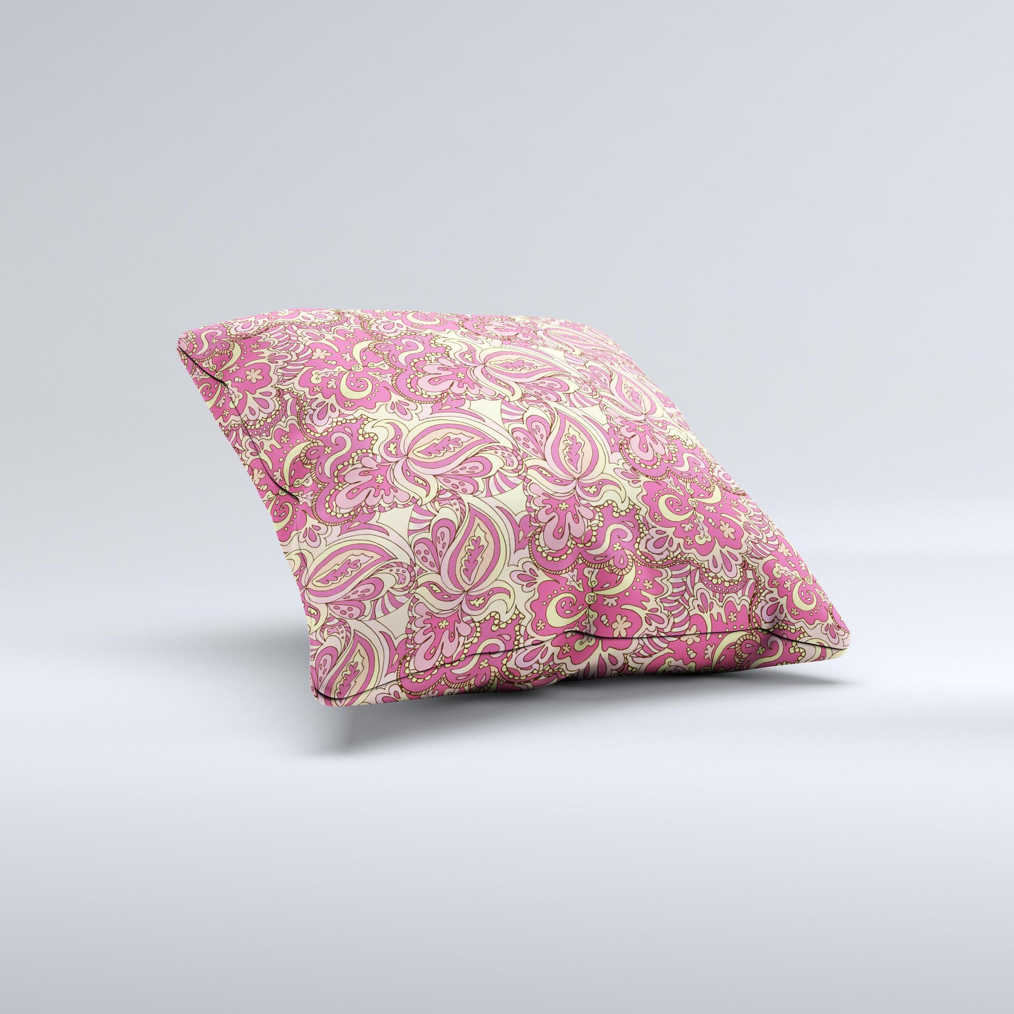 Yellow and pink paisley floral decorative throw pillow, handcrafted with high thread count fabric and polyester filling, showcasing unique design.