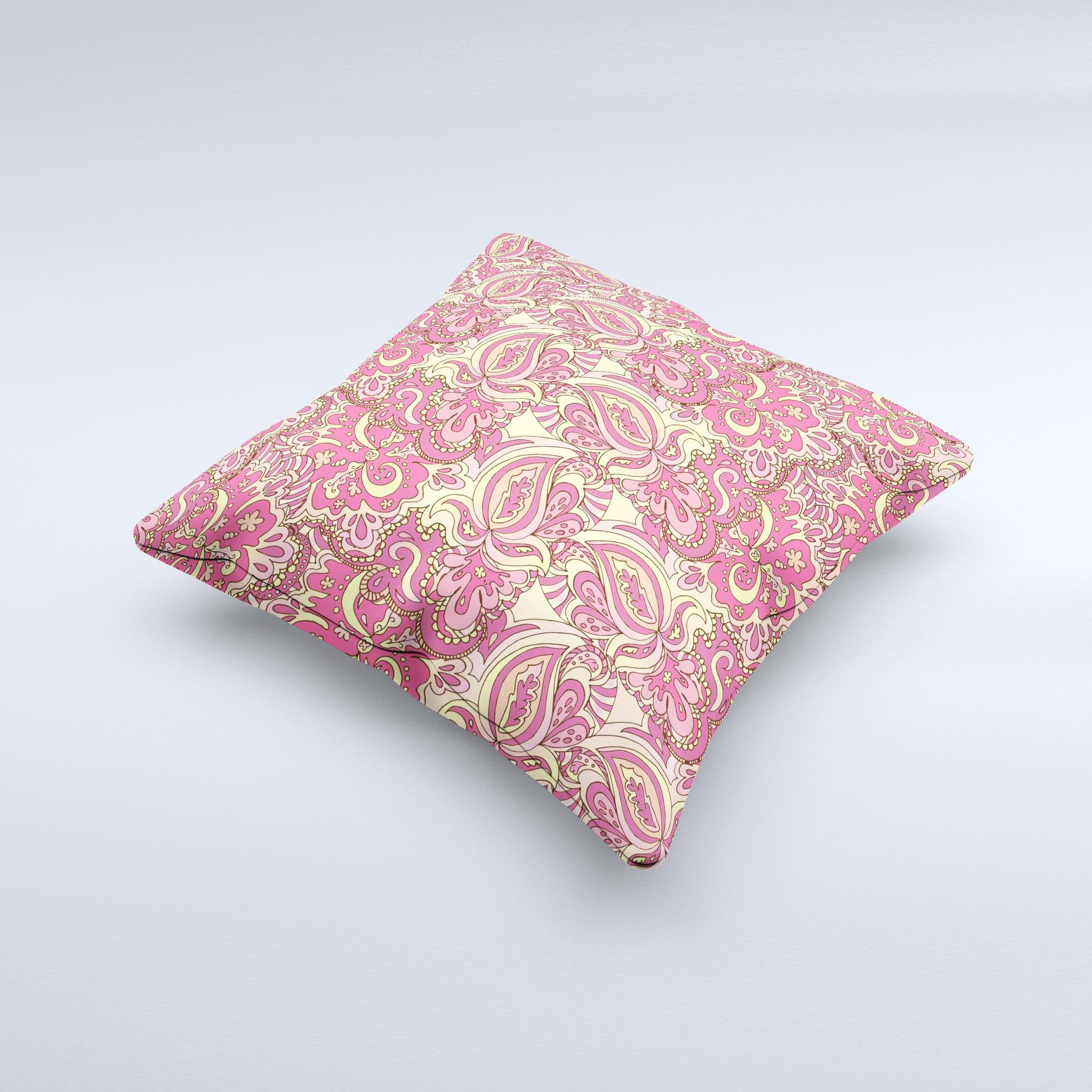 Yellow and pink paisley floral decorative throw pillow, handcrafted with high thread count fabric and polyester filling, showcasing unique design.