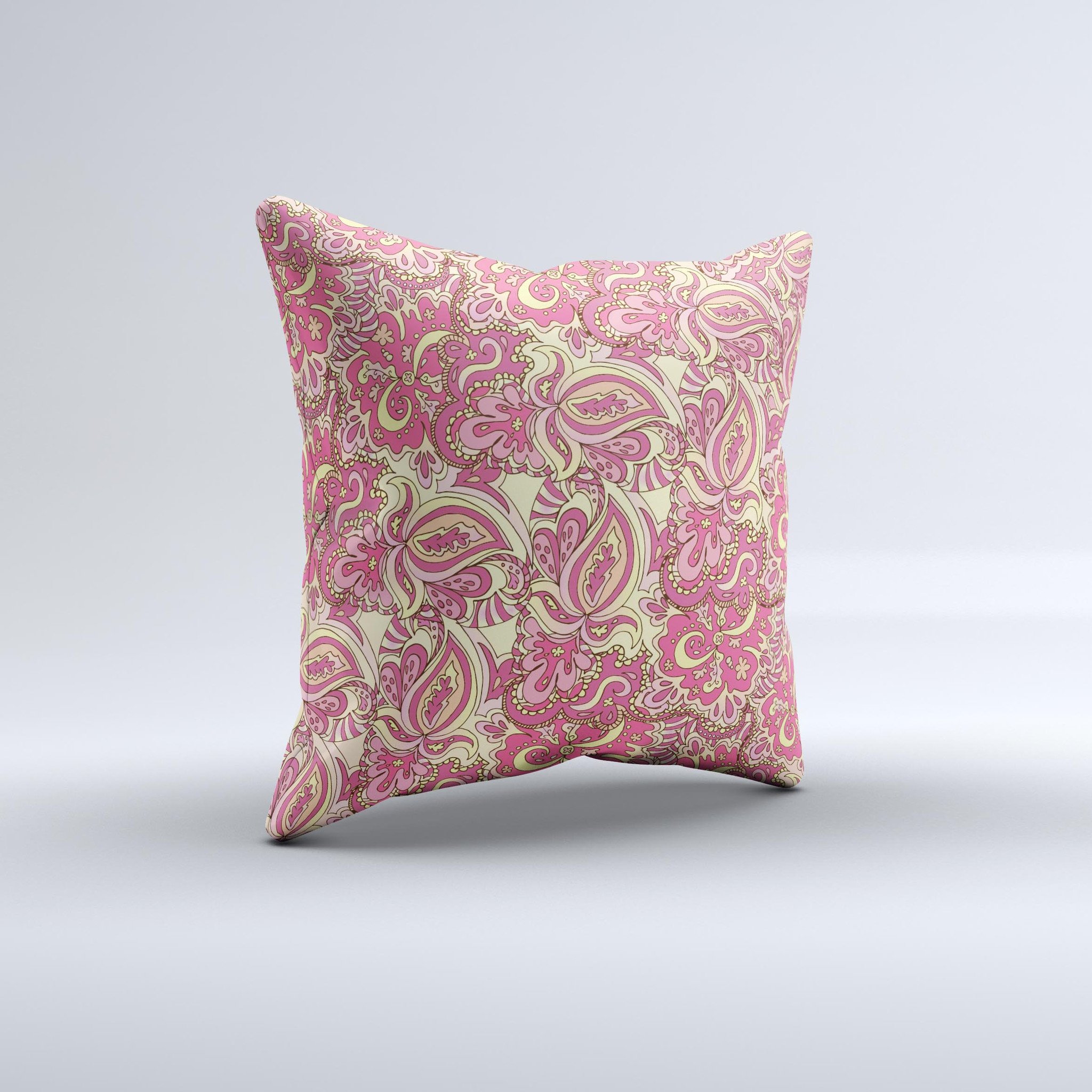 Yellow and pink paisley floral decorative throw pillow, handcrafted with high thread count fabric and polyester filling, showcasing unique design.