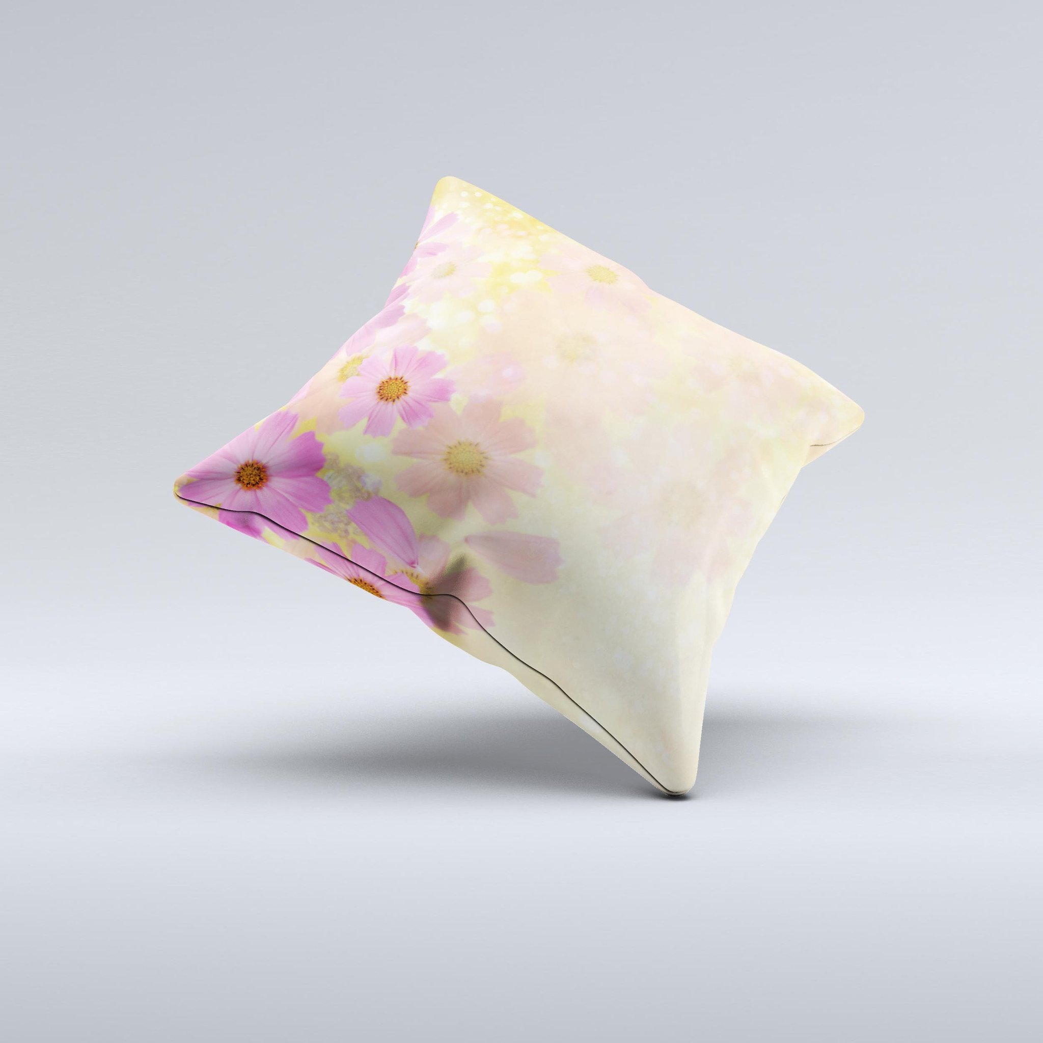 Yellow and pink decorative throw pillow with floral design, handcrafted in Virginia, showcasing unique ink-fuzed graphics.