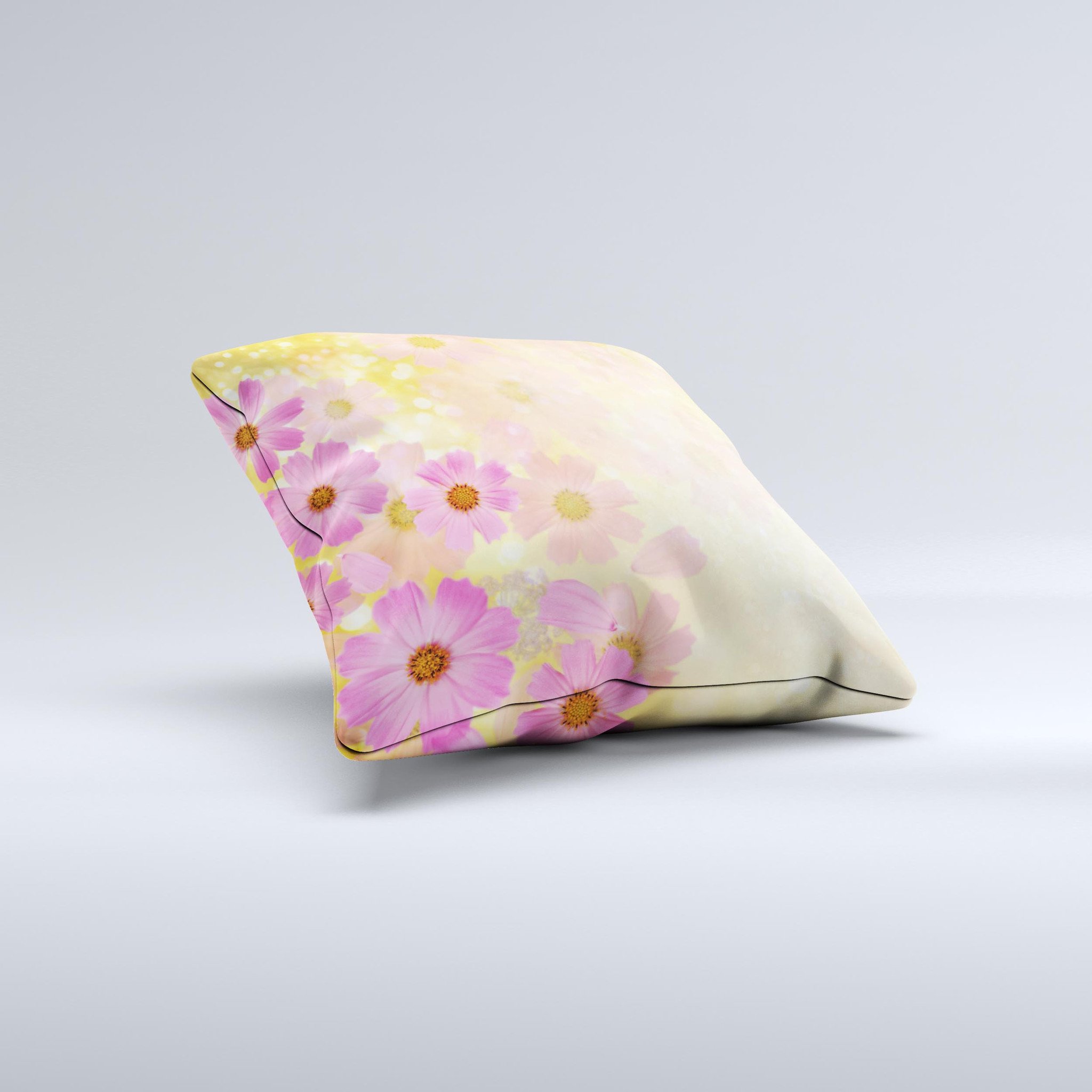 Yellow and pink decorative throw pillow with floral design, handcrafted in Virginia, showcasing unique ink-fuzed graphics.