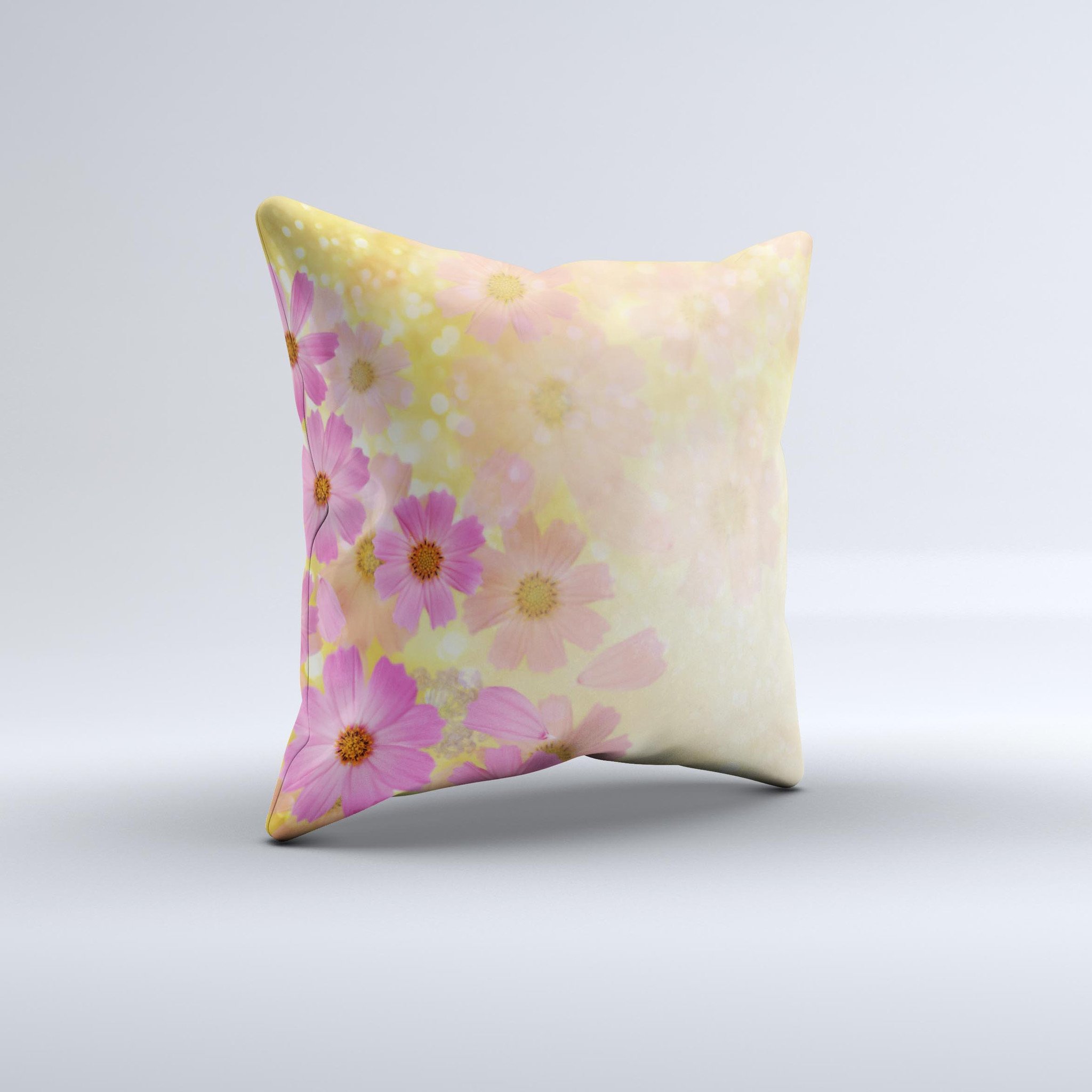 Yellow and pink decorative throw pillow with floral design, handcrafted in Virginia, showcasing unique ink-fuzed graphics.