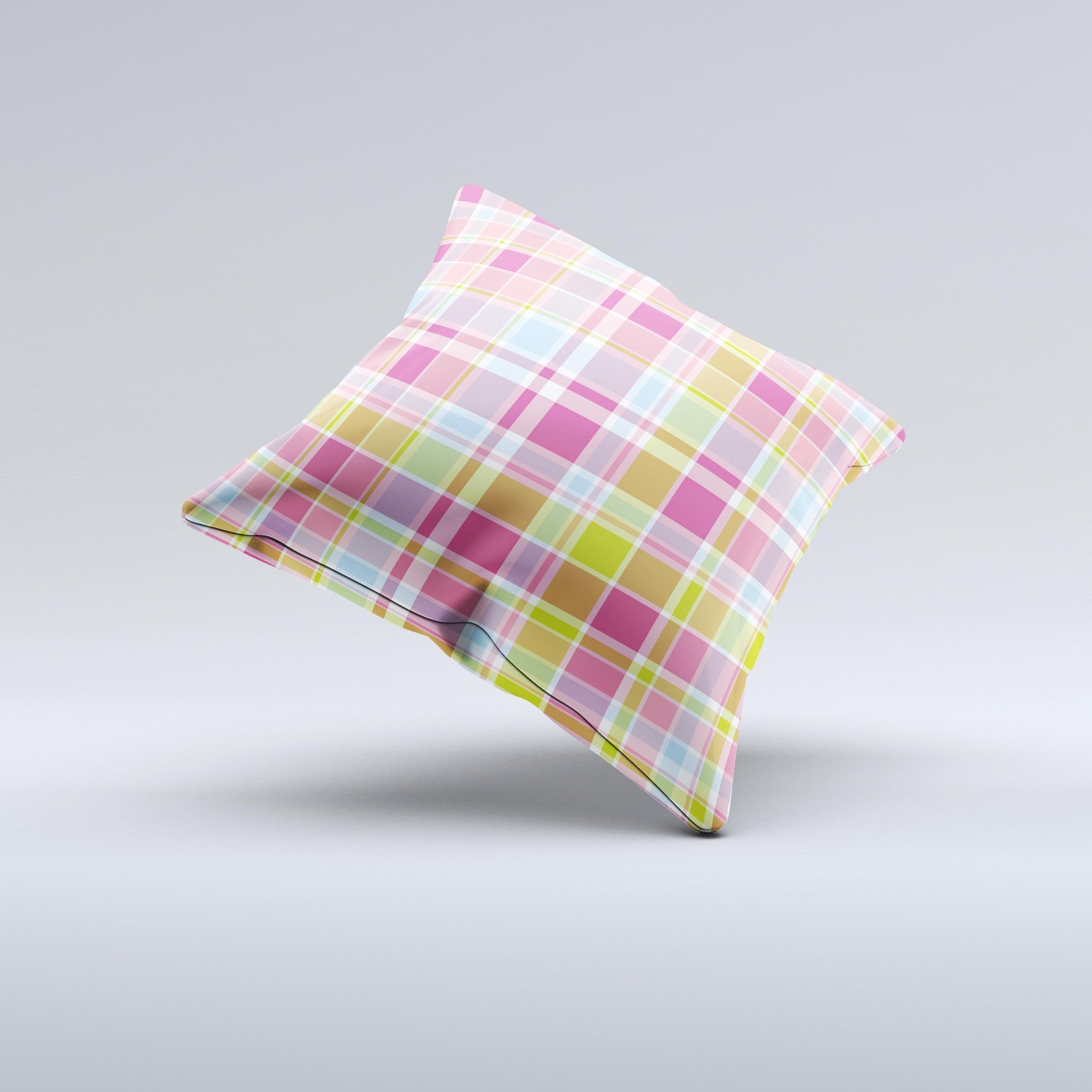 A vibrant yellow and pink plaid decorative throw pillow, handcrafted in Virginia, showcasing unique patterns and high-quality fabric.