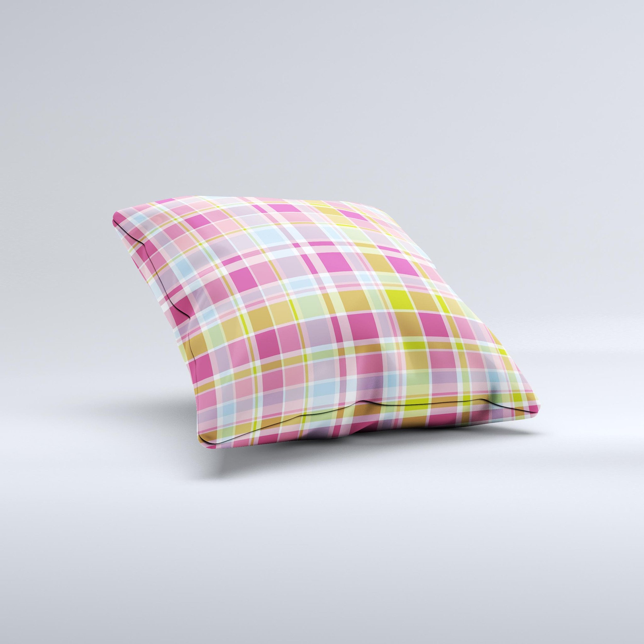 A vibrant yellow and pink plaid decorative throw pillow, handcrafted in Virginia, showcasing unique patterns and high-quality fabric.