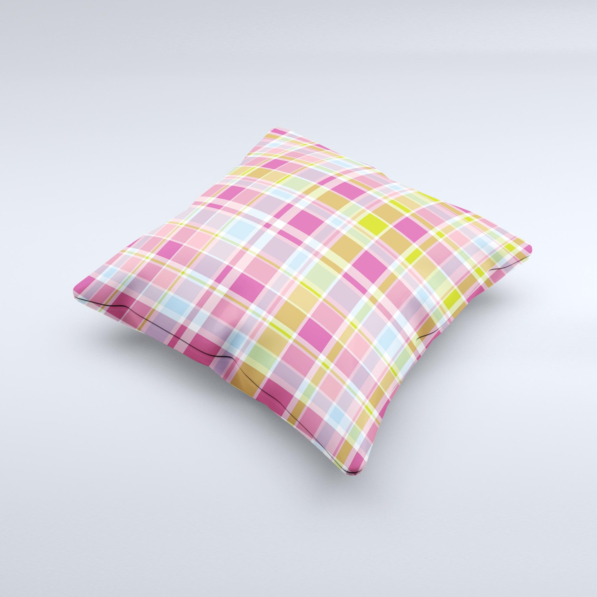 A vibrant yellow and pink plaid decorative throw pillow, handcrafted in Virginia, showcasing unique patterns and high-quality fabric.