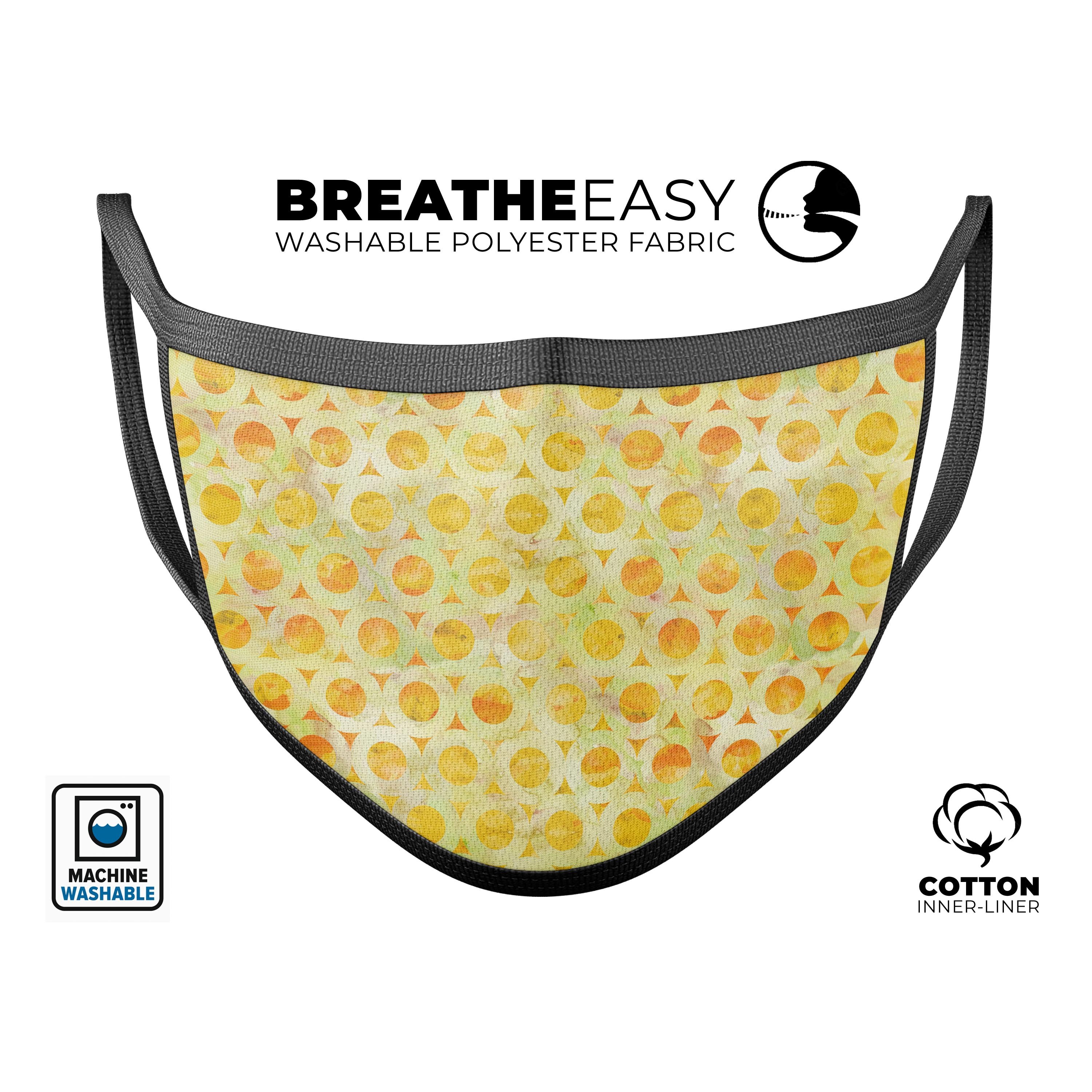 Yellow watercolor ring pattern face mask, adjustable ear-loops, made in USA, comfortable cotton interior.