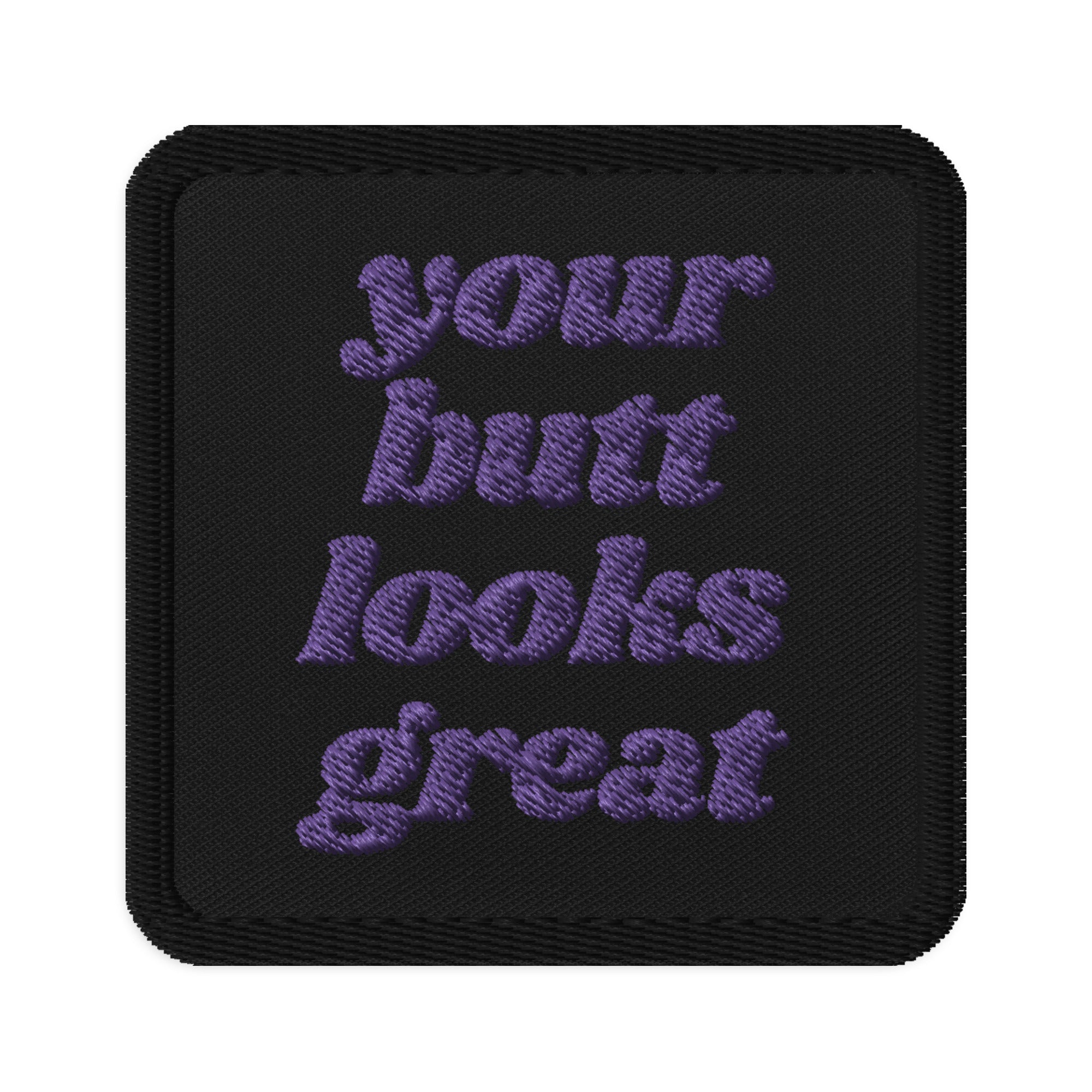 Colorful 'Your Butt Looks Great' embroidered patch on a fabric background, showcasing its vibrant design and quality stitching.