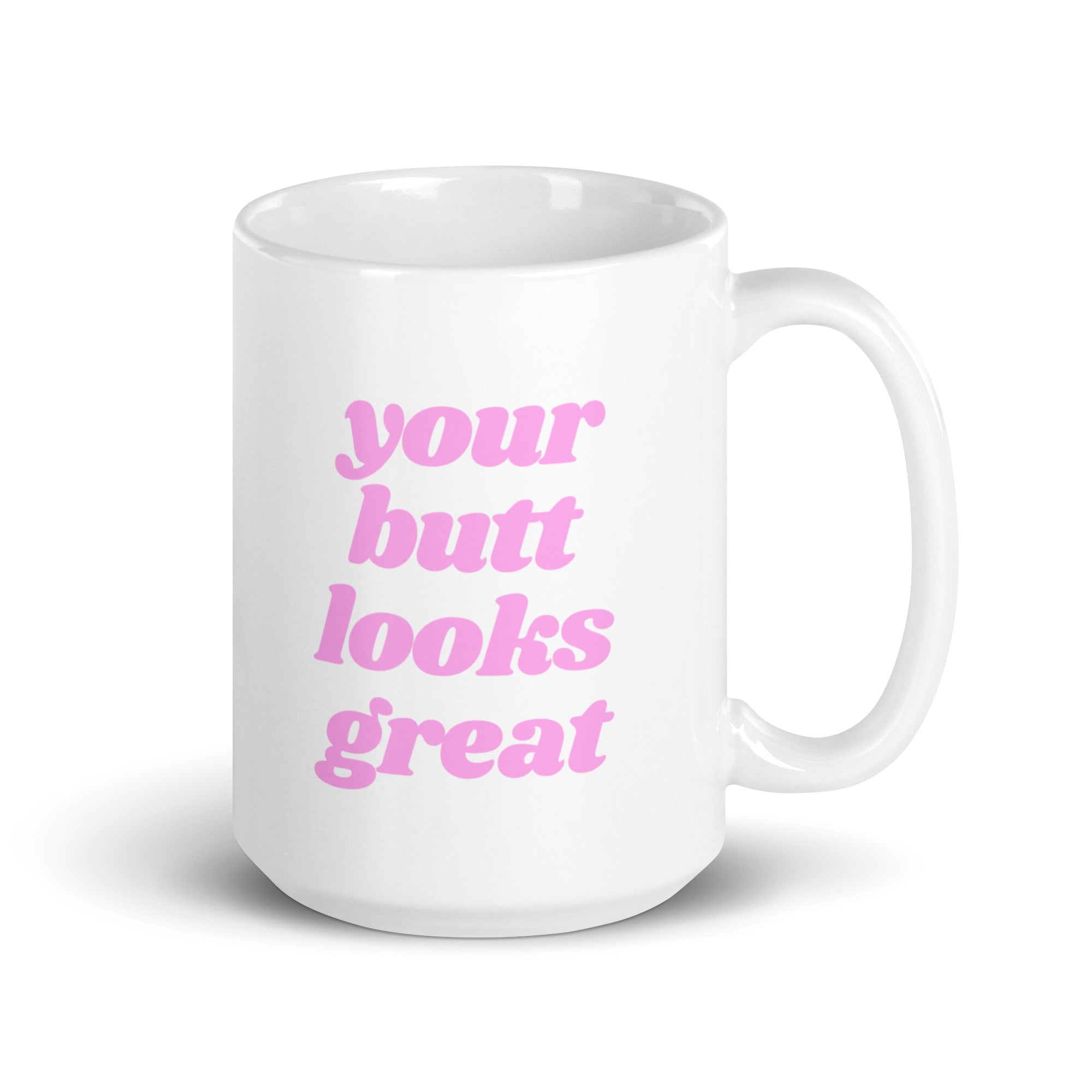 A glossy ceramic mug featuring a motivational print that reads 'Your Butt Looks Great', available in two sizes.