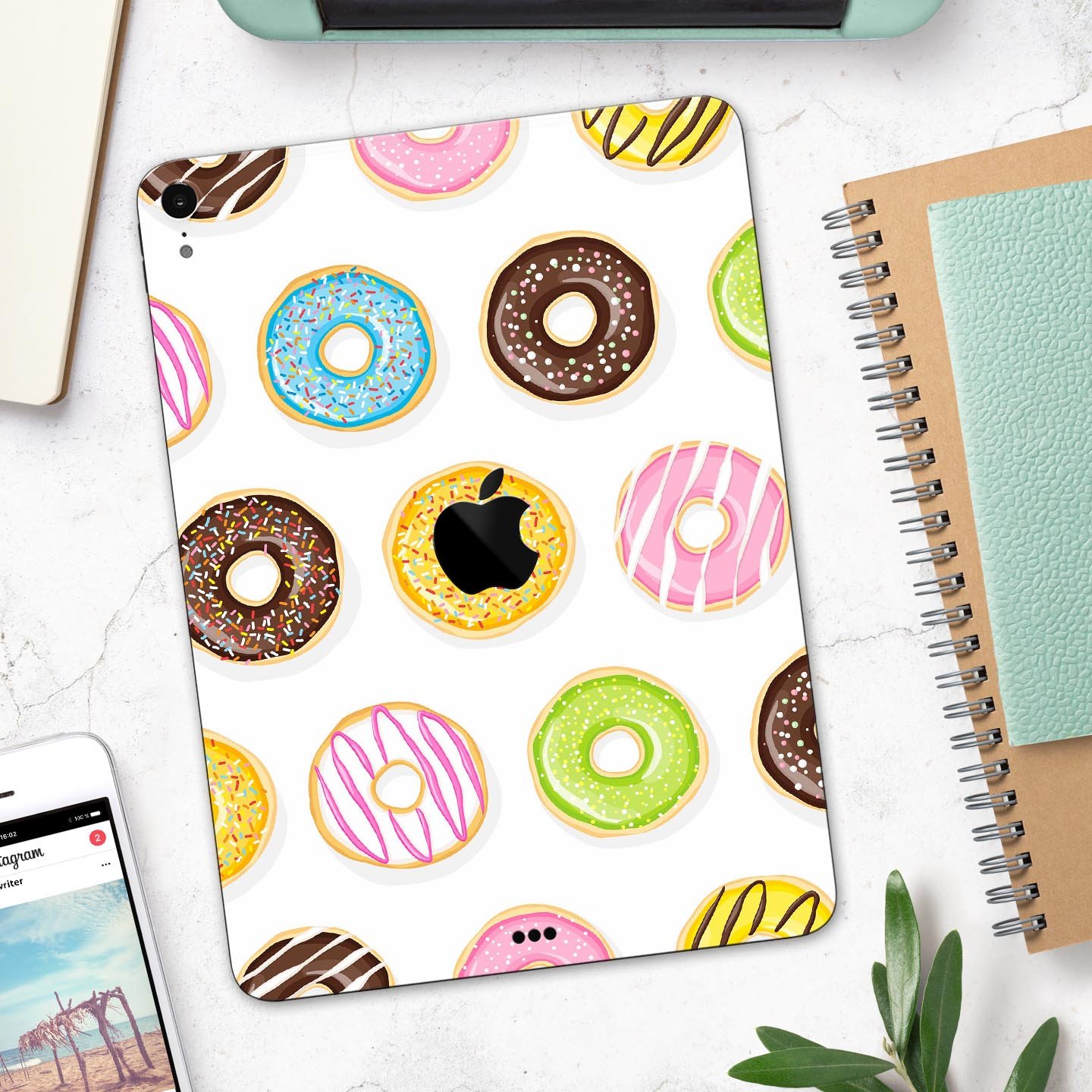 Yummy Colored Donuts Full Body Skin Decal for Apple iPad Pro, showcasing vibrant donut designs on a sleek surface.