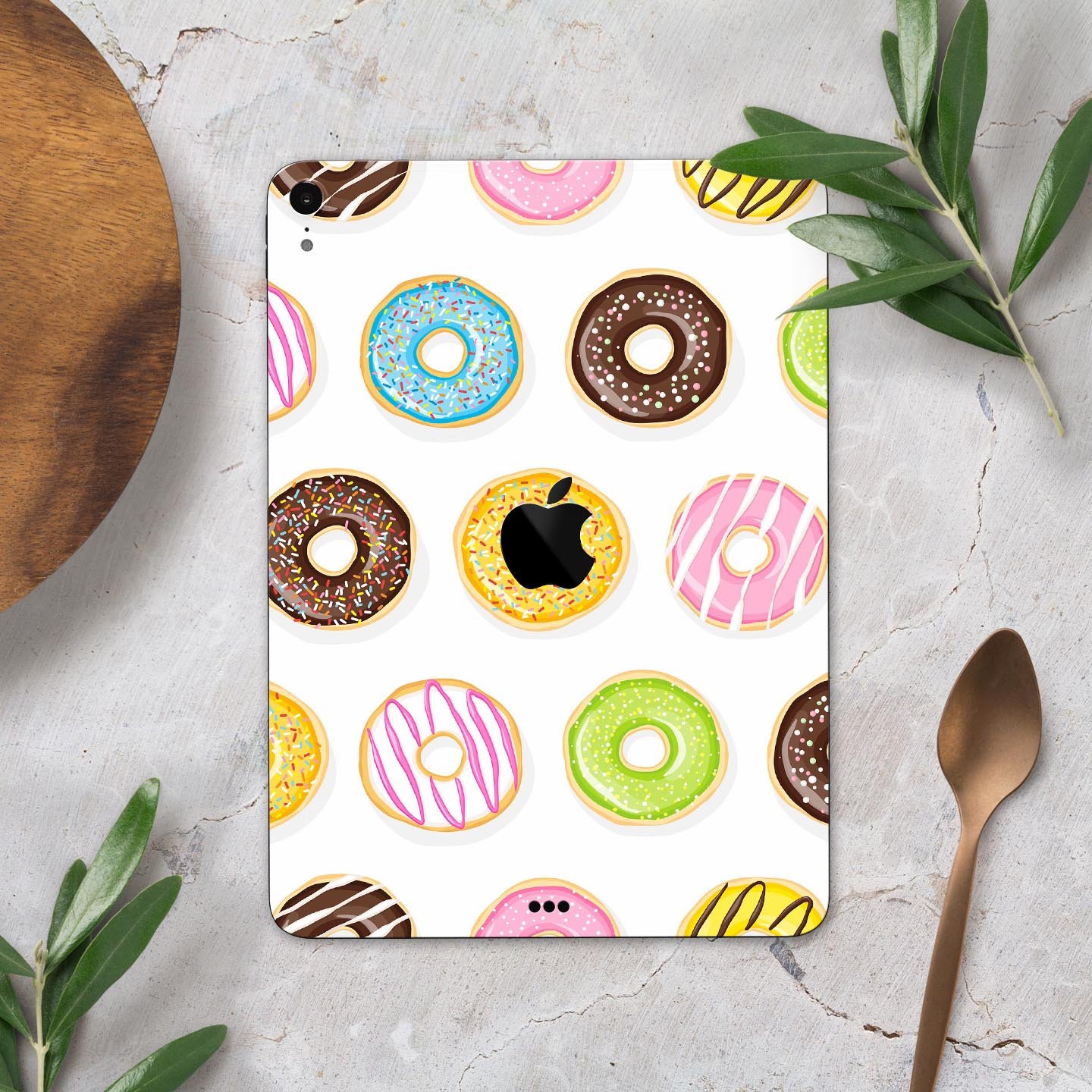 Yummy Colored Donuts Full Body Skin Decal for Apple iPad Pro, showcasing vibrant donut designs on a sleek surface.