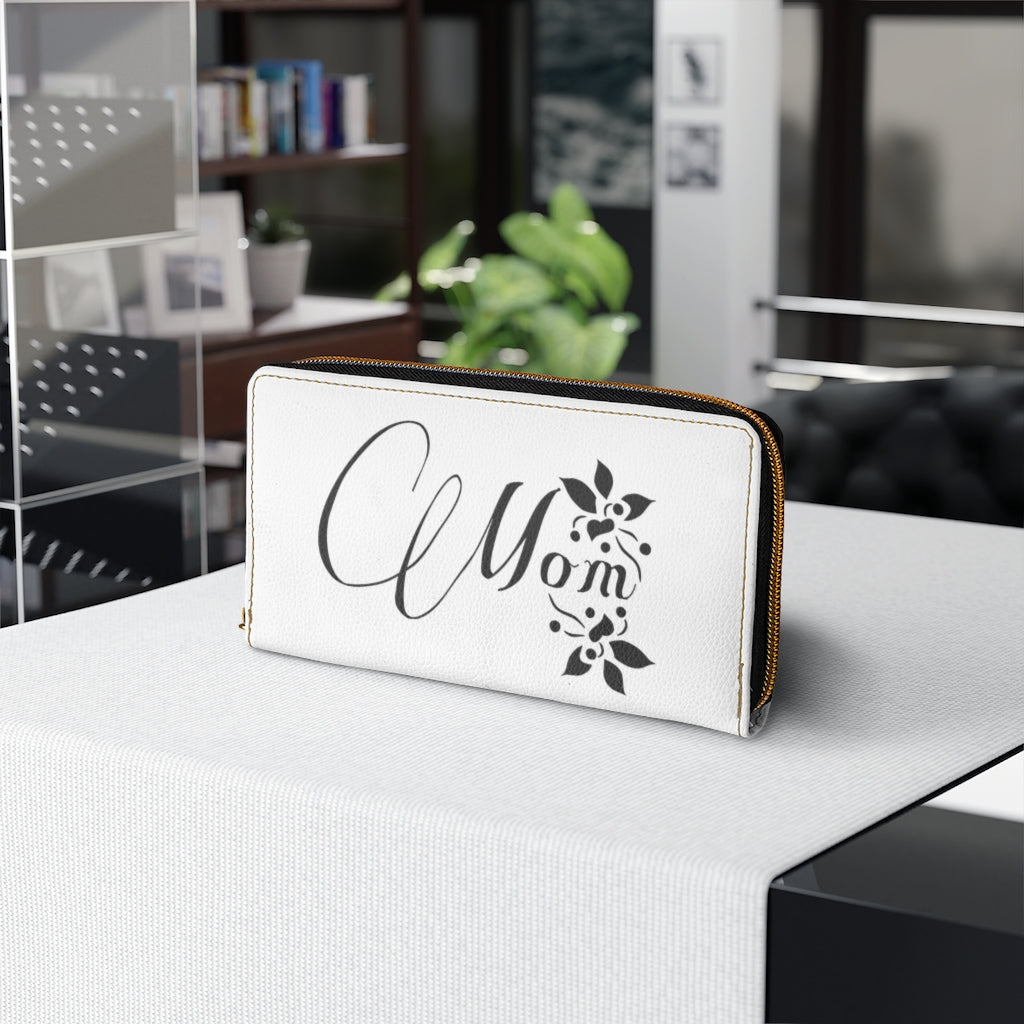 Stylish white zipper wallet featuring a mom graphic, made from cruelty-free faux leather with gold stitching.