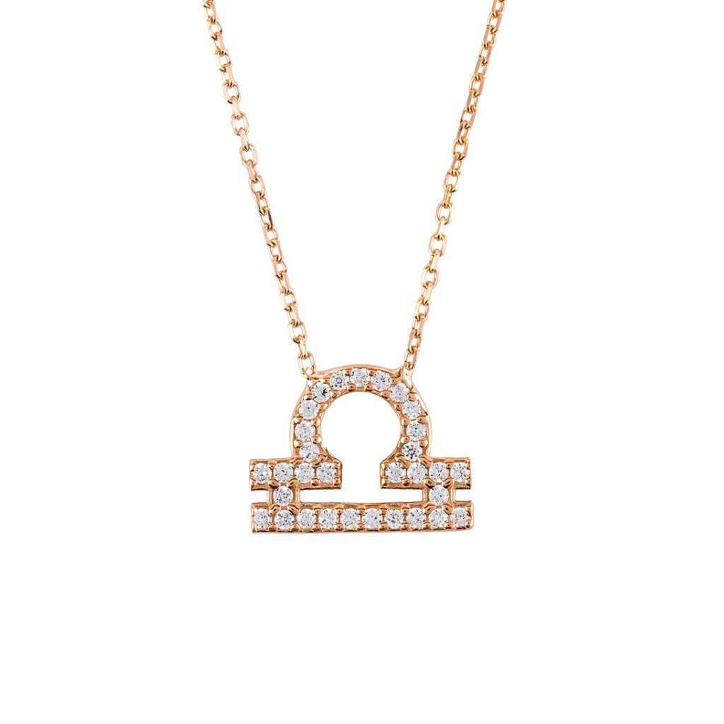 Rose gold Libra zodiac star sign pendant necklace with white zircons, displayed elegantly in a signature box.