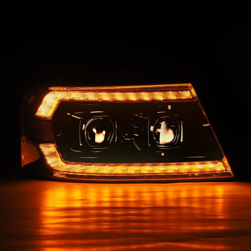 AlphaRex PRO-Series Projector Headlights for 2004-2008 Ford F150, featuring chrome finish and sequential LED turn signals.