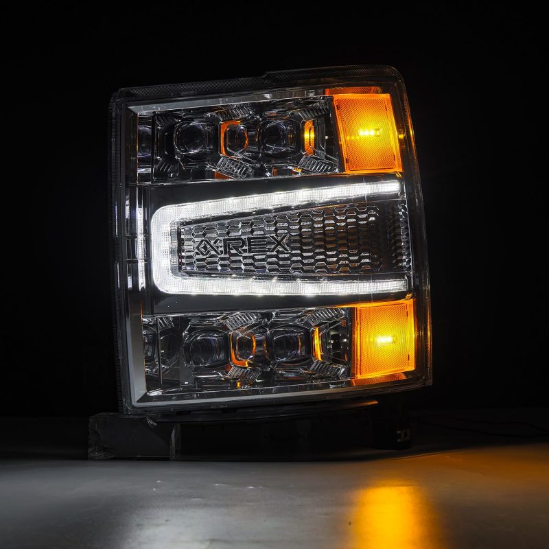 AlphaRex NOVA-Series LED projector headlights for 2014-2015 Chevy Silverado 1500, featuring chrome finish and advanced lighting technology.