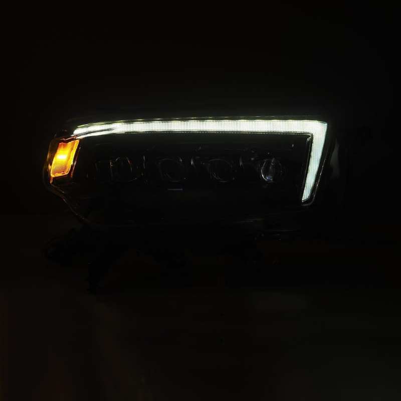 AlphaRex NOVA LED projector headlights for 2010-2013 Toyota 4Runner, featuring Ice Cube 3D projector design and Osram LED technology.