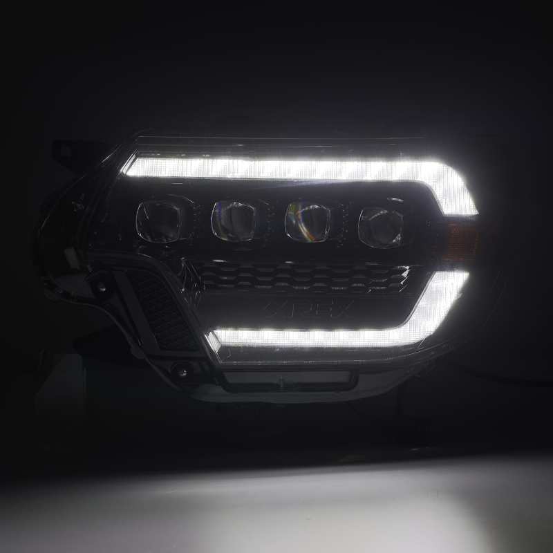 AlphaRex NOVA LED projector headlights for 2012-2015 Toyota Tacoma, featuring sleek black design and advanced lighting technology.