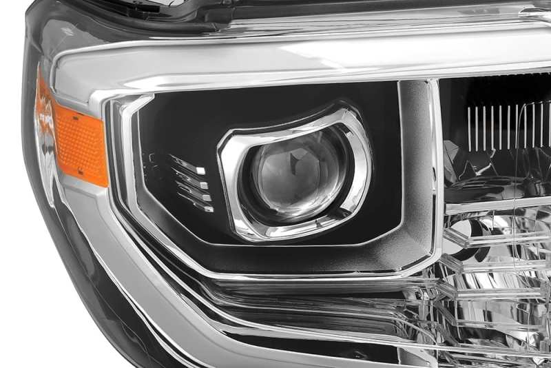 AlphaRex PRO-Series projector headlights for 2014-2021 Toyota Tundra in chrome finish, showcasing modern design and advanced lighting technology.