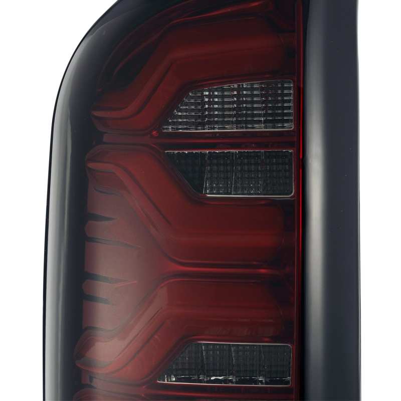 AlphaRex PRO-Series LED Tail Lights for 2016-2020 Toyota Tacoma with red smoke lens, showcasing modern design and enhanced visibility.