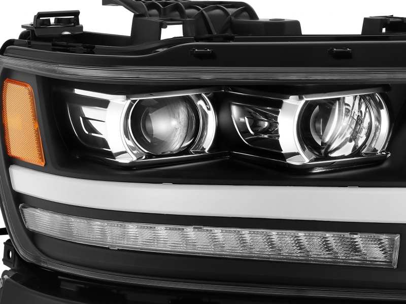 AlphaRex LUXX LED Projector Headlights for 2019-2020 Dodge Ram 1500 in plank jet black finish, showcasing sleek design and advanced lighting technology.