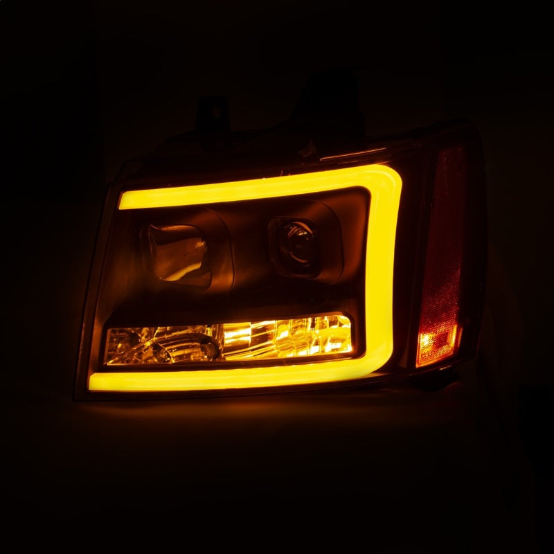 ANZO 07-14 Chevy Tahoe Projector Headlights with sleek plank style design, showcasing modern aesthetics and high-quality construction.