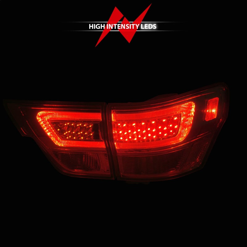 ANZO LED taillights for 2011-2013 Jeep Grand Cherokee with clear lens and black housing, featuring a lightbar design.