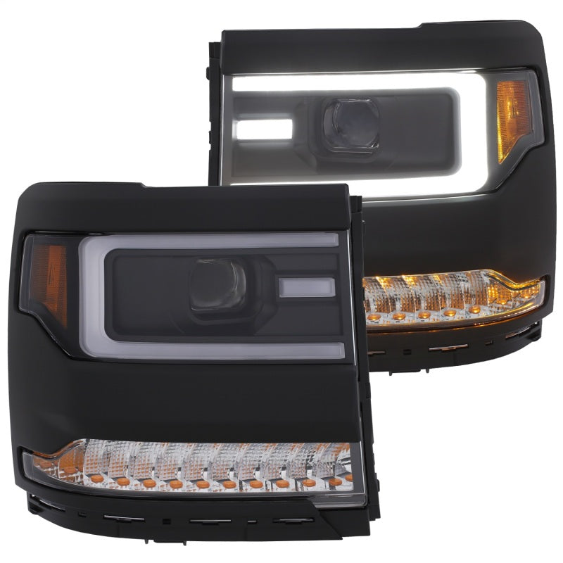 ANZO 16+ Chevy Silverado 1500 projector headlights with black housing and clear lens, showcasing modern design and enhanced visibility.