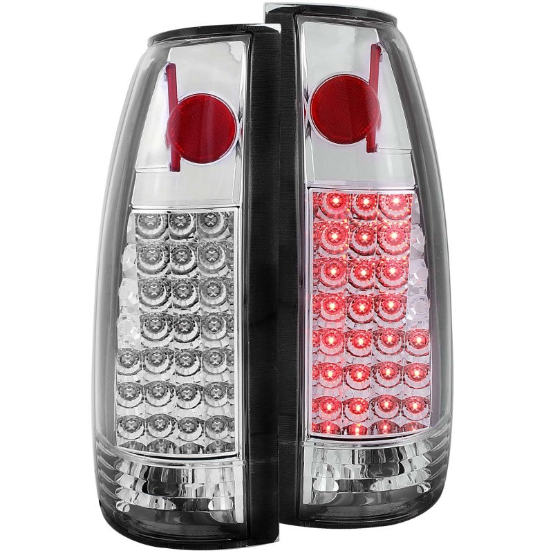 ANZO LED taillights for 1999-2000 Cadillac Escalade with chrome housing and clear lens, showcasing modern design and enhanced visibility.