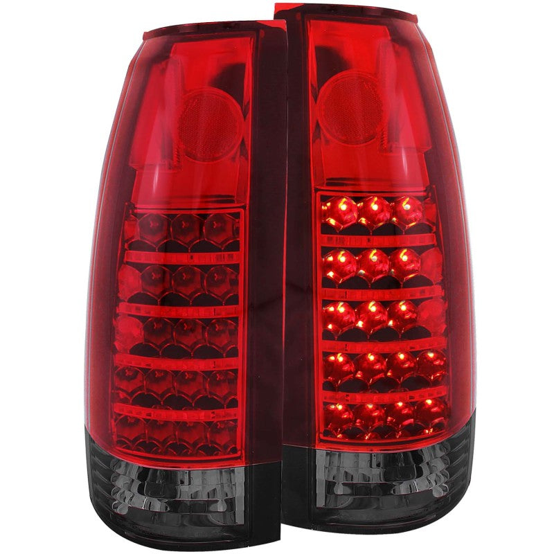 ANZO LED taillights for 1999-2000 Cadillac Escalade featuring a red/smoke lens and red reflector, designed for enhanced visibility and style.