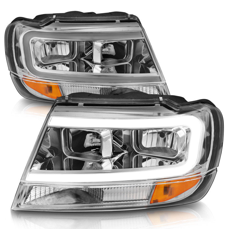 ANZO Crystal Headlight Set for 1999-2004 Jeep Grand Cherokee with clear lens and black housing.