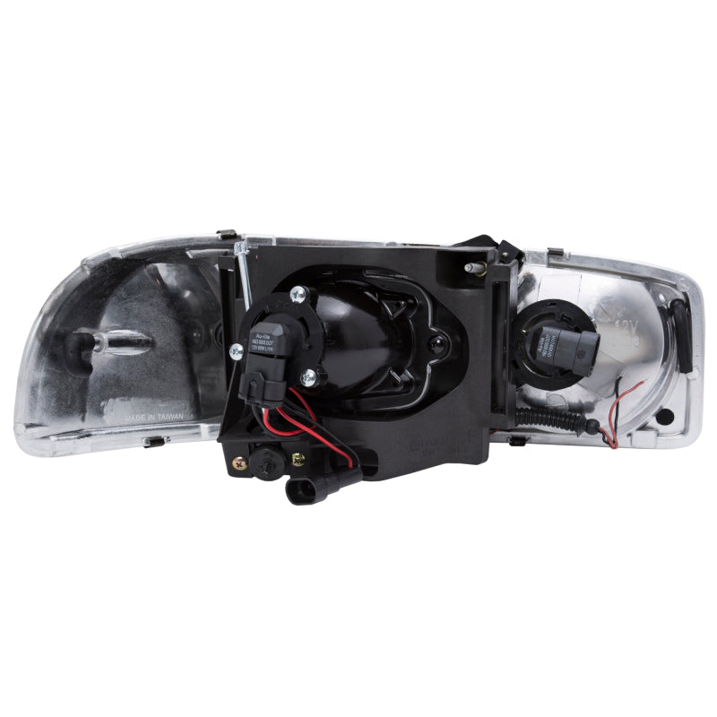 ANZO 1999-2006 GMC Sierra 1500 projector headlights with U-Bar in black housing, showcasing clear lens and modern design.