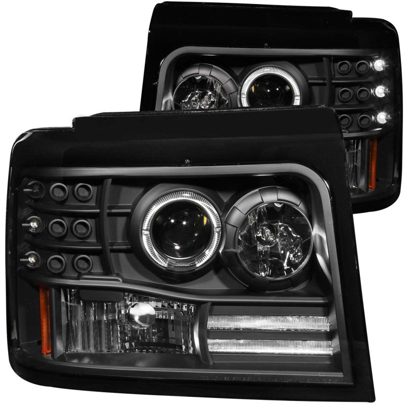 ANZO 1992-1996 Ford F-150 Projector Headlights with Halo in black housing, showcasing clear lens and side marker lights.