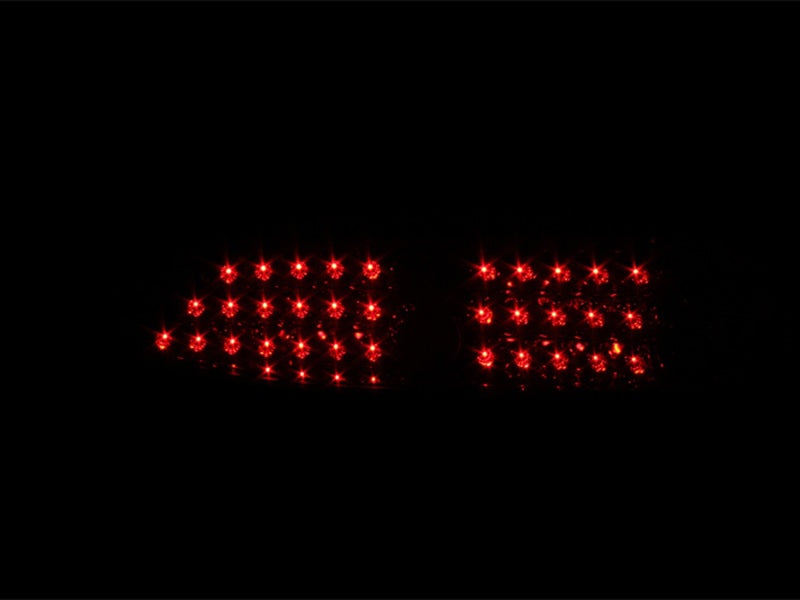 ANZO LED taillights for 1993-2002 Chevrolet Camaro with smoke lens, showcasing modern design and enhanced visibility.