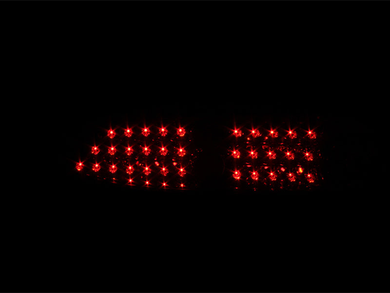 ANZO LED taillights for 1993-2002 Chevrolet Camaro with smoke lens, showcasing modern design and enhanced visibility.