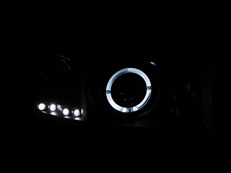 ANZO 1994-2001 Dodge Ram Projector Headlights with Halo Black, featuring clear lens and sleek black housing.