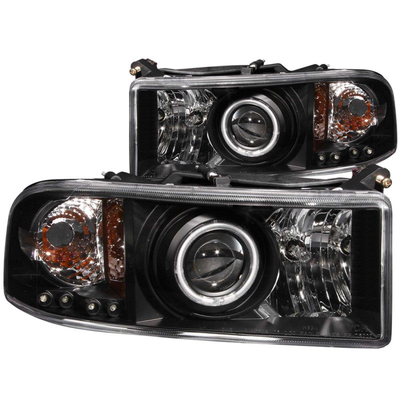 ANZO 1994-2001 Dodge Ram Projector Headlights with Halo in black housing, showcasing clear lens and modern design.