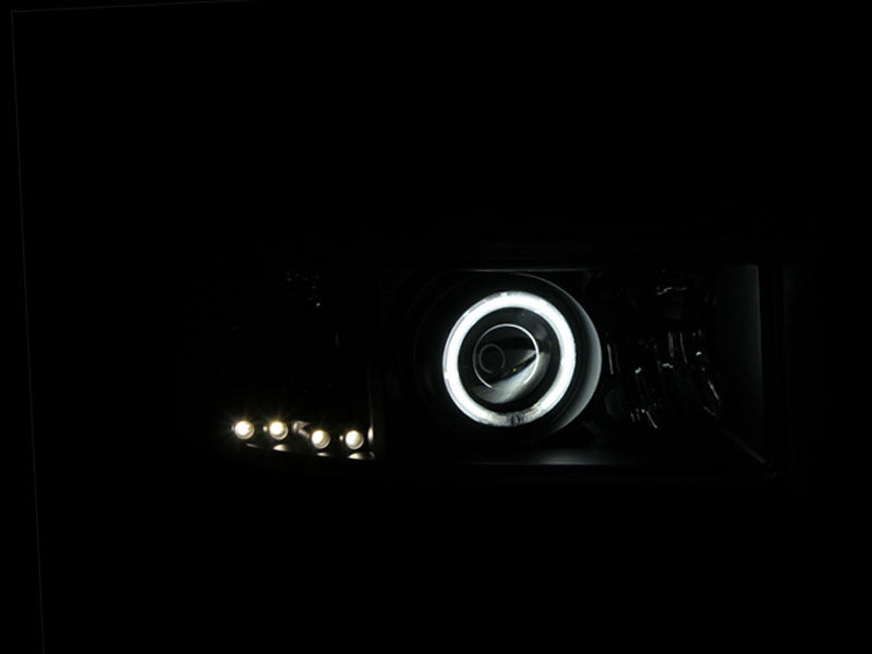 ANZO 1994-2001 Dodge Ram Projector Headlights with Halo in black housing, showcasing clear lens and modern design.