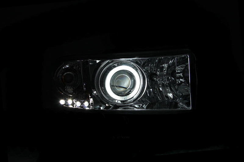 ANZO projector headlights with halo chrome for Dodge Ram, featuring clear lens and chrome housing, designed for enhanced visibility and style.