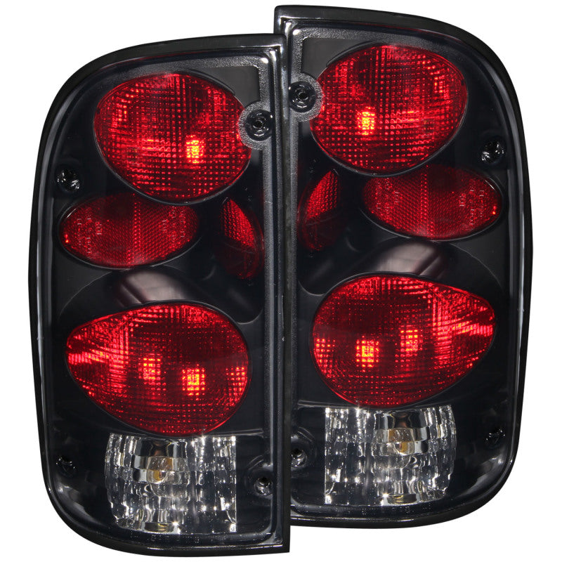 ANZO 1995-2000 Toyota Tacoma Taillights with dark smoke lens, showcasing a sleek design and modern look.