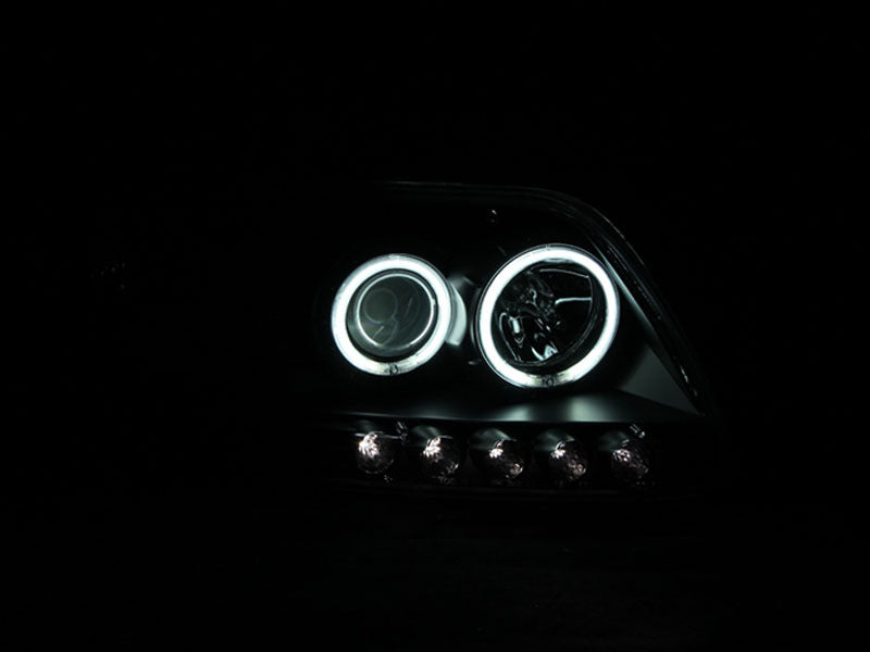 ANZO 1997-2003 Ford F-150 Projector Headlights with Halo Black, showcasing clear lens and sleek black housing.