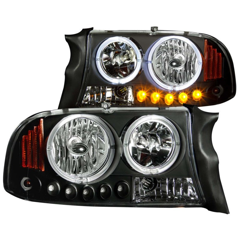 ANZO 1997-2004 Dodge Dakota Crystal Headlights with black housing and clear lens, showcasing sleek design and modern aesthetics.