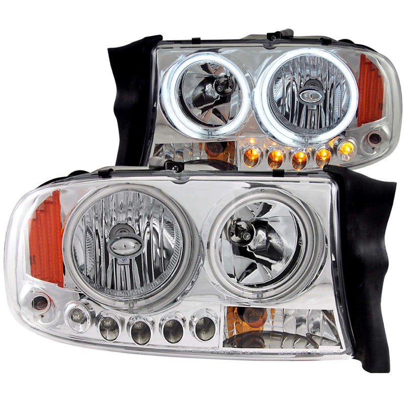 ANZO 1997-2004 Dodge Dakota Crystal Headlights with chrome housing and clear lens, showcasing their sleek design.