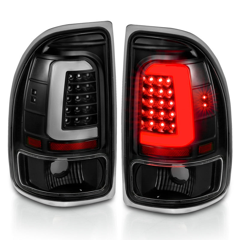 ANZO 1997-2004 Dodge Dakota LED taillights featuring black housing and clear lens, designed for enhanced visibility and style.