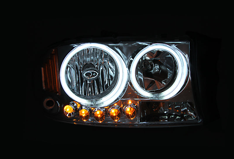 ANZO 1997-2004 Dodge Dakota Projector Headlights with Halo, featuring black housing and clear lens design.