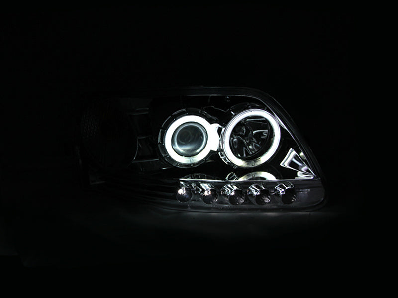 ANZO 1997.5-2003 Ford F-150 Projector Headlights with Halo Chrome design, showcasing clear lens and chrome housing.