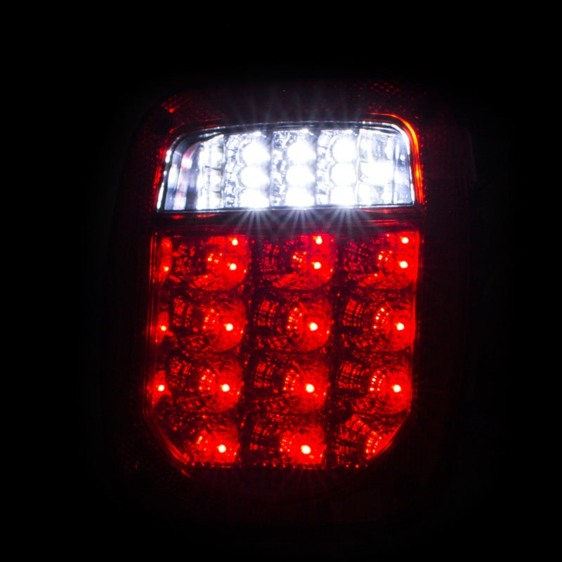 ANZO LED Tail Light Assembly for Jeep Wrangler, featuring red/clear lens and chrome housing, designed for improved visibility and style.