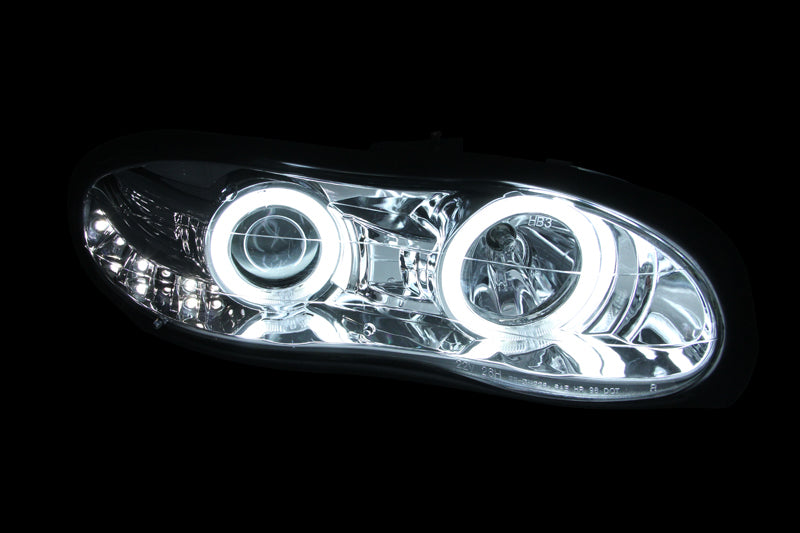 ANZO 1998-2002 Chevrolet Camaro Projector Headlights with Halo Chrome, showcasing clear lens and chrome housing.